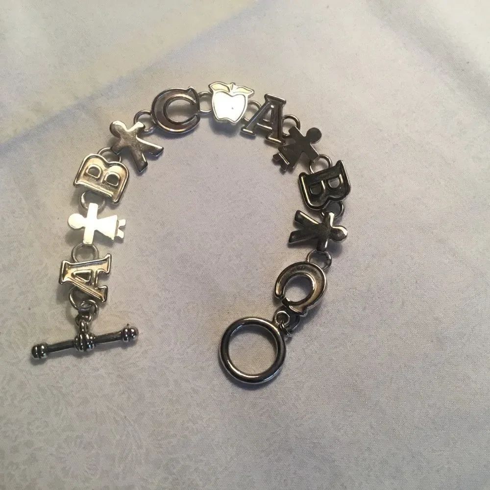$10 ea or 3/$20. Silvertone A-B-C Teacher Bracelet
